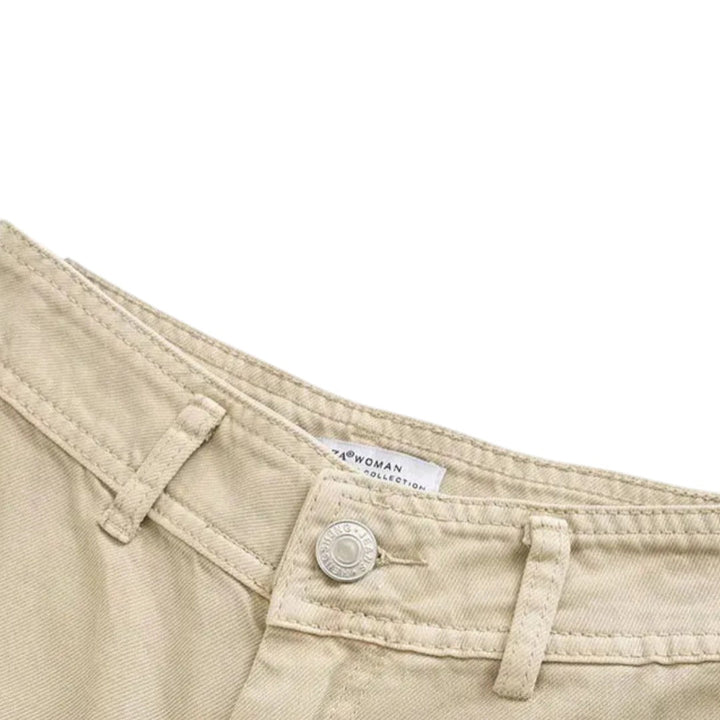 Jean à taille haute et jambes évasées Ruby avec poches arrière patch