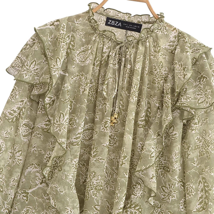 Ivy | Blouse en chiffon floral avec détails à volants