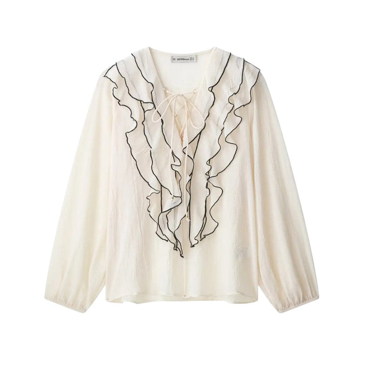 Isla | Blouse crème avec finition à volants contrastés