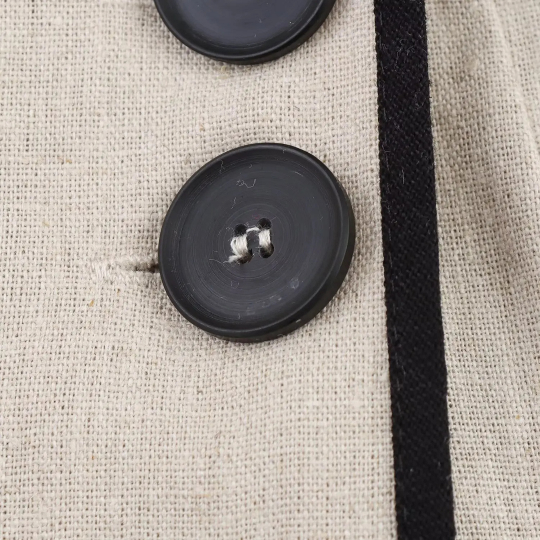Camille | Robe sans manches ceinturée à contraste noir