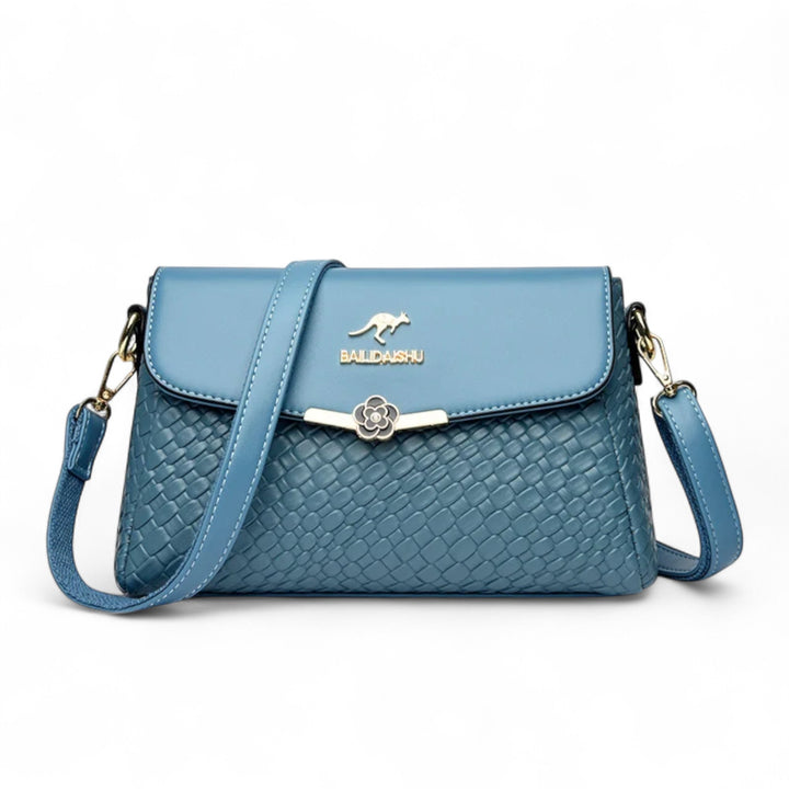 Léonie | Sac Bandoulière Tressé avec Détail Floral Métallique