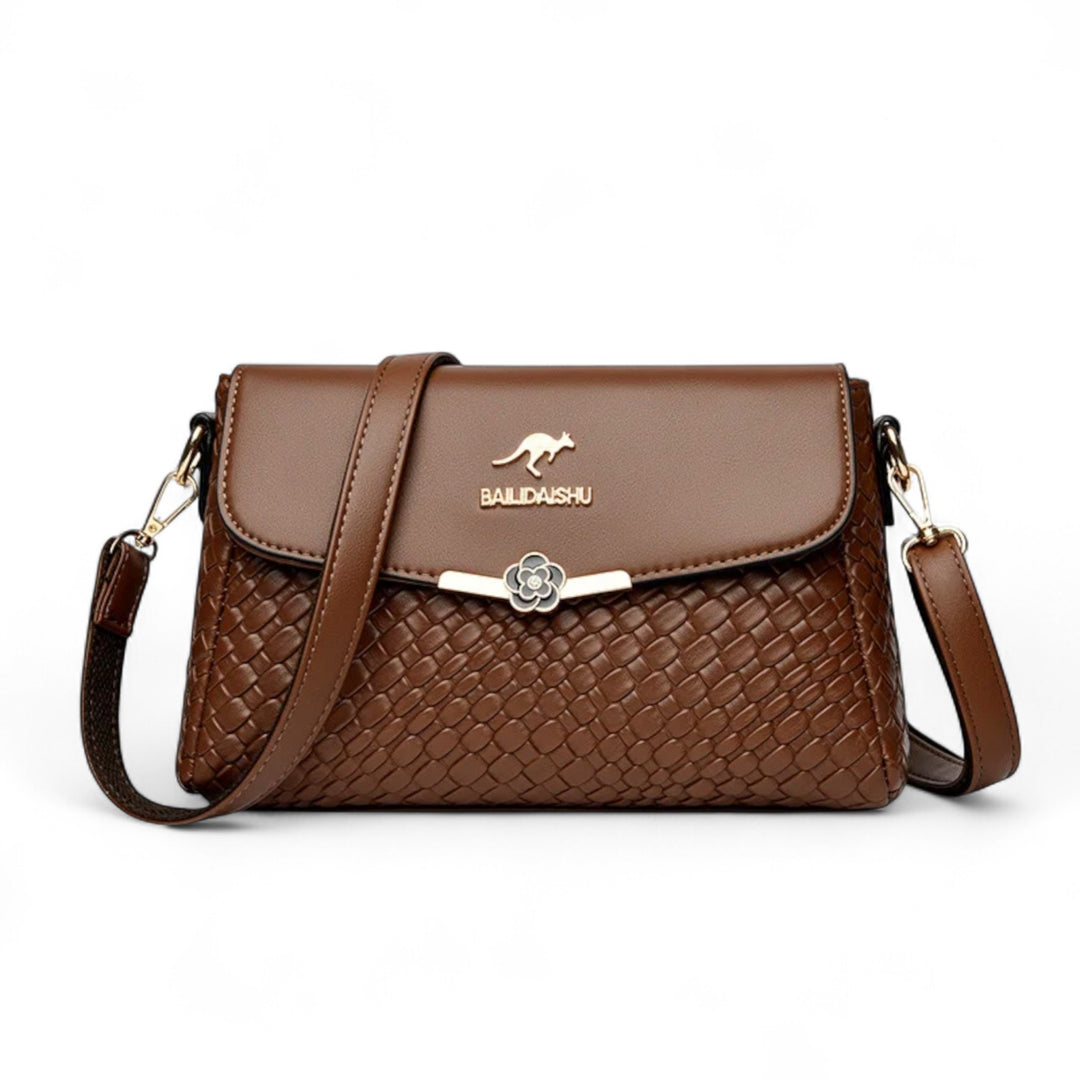 Léonie | Sac Bandoulière Tressé avec Détail Floral Métallique